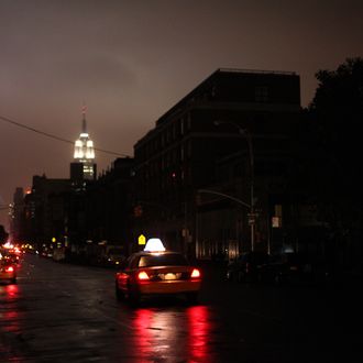 NEW YORK, NY - OCTOBER 29: Power outage seen on October 29, 2012 in Manhattan, New York. Hurricane Sandy, which threatens 50 million people in the Mid-Atlantic area of the United States, is expected to bring days of rain, high winds and possibly heavy snow. New York Governor Andrew Cuomo announced the closure of all New York City bus, subway and commuter rail services as of Sunday evening. (Photo by Allison Joyce/Getty Images)