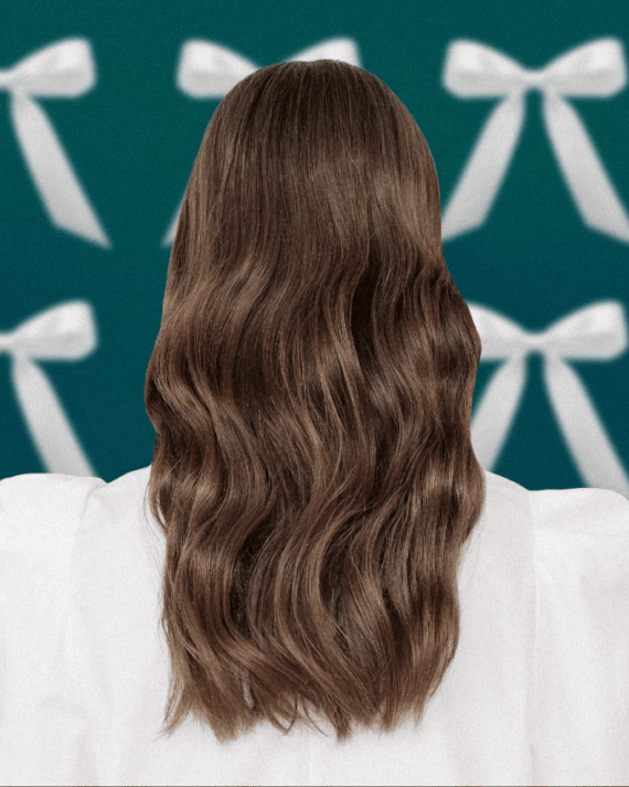 A person with long wavy brown hair in a white dress on a moving teal background featuring white bows.