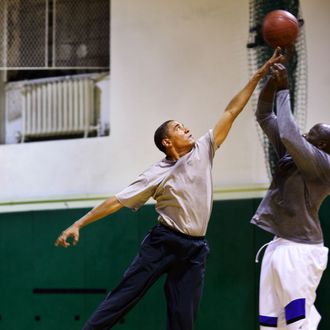 President Barack Obama plays basketball with personal aide Reggie Love at St Bartholomew's Church in New York City, where the President is attending the United Nations General Assembly, Sept. 23, 2009. 