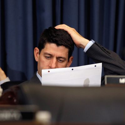 House Budget Committee Chairman Paul Ryan (R-WI) (C) looks over documents during a hearing on Capitol Hill June 6, 2012 in Washington, DC. The committee heard testimony from Congressional Budget Office Director Douglas Elmendorf about the CBO's long-term budget outlook.DANVILLE, KY - OCTOBER 11: U.S. Rep. Paul Ryan (R-WI) listens during the vice presidential debate at Centre College October 11, 2012 in Danville, Kentucky. This is the second of four debates during the presidential election season and the only debate between the vice presidential candidates before the closely-contested election November 6. (Photo by Chip Somodevilla/Getty Images)WASHINGTON, DC - JUNE 06: House Budget Committee Chairman Paul Ryan (R-WI) (C) looks over documents during a hearing on Capitol Hill June 6, 2012 in Washington, DC. The committee heard testimony from Congressional Budget Office Director Douglas Elmendorf about the CBO's long-term budget outlook. (Photo by Chip Somodevilla/Getty Images)