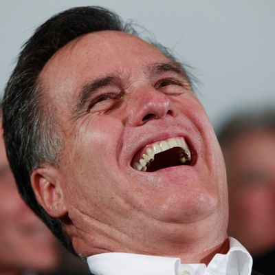 Republican presidential candidate, former Massachusetts Gov. Mitt Romney, laughs as Sen. John McCain, R-Ariz., tells jokes as he campaigns in Hilton Head, S.C., Friday, Jan. 13, 2012. 