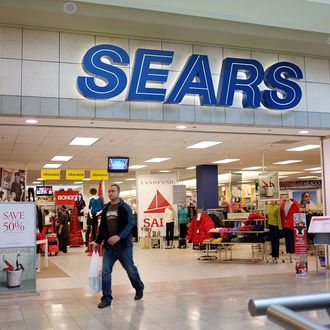 MILFORD, CT - DECEMBER 27: A man walks out of a Sears store on December 27, 2011 in Milford, Connecticut. Sears Holdings Corp has announced that it plans to close between 100 and 120 Sears and Kmart stores following poor sales during the holidays. (Photo by Spencer Platt/Getty Images)