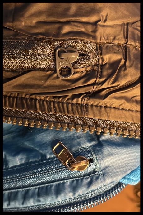 Side by side comparison of the Quince Insulated Hybrid Hoodie and Patagonia Nano Puff. the 