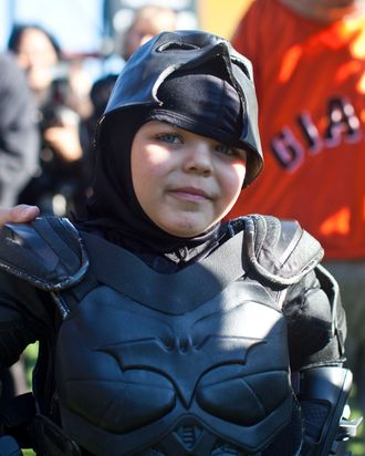 SAN FRANCISCO, CA - NOVEMBER 15: Leukemia survivor Miles, 5, dressed as BatKid, visits AT&T Park as part of a Make-A-Wish foundation fulfillment November 15, 2013 in San Francisco. The Make-A-Wish Greater Bay Area foundation turned the city into Gotham City for Miles by creating a day-long event bringing his wish to be BatKid to life. (Photo by Ramin Talaie/Getty Images)