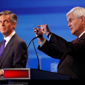 AMES, IA - AUGUST 11: Republican presidential candidates former House Speaker Newt Gingrich (R) and former Utah Gov. Jon Huntsman are pictured during the Iowa GOP/Fox News Debate on August 11, 2011 at the CY Stephens Auditorium in Ames, Iowa. This is the first Republican presidential debate in the state ahead of Saturday's all important Iowa Straw Poll. (Charlie Neibergall-Pool/Getty Images)