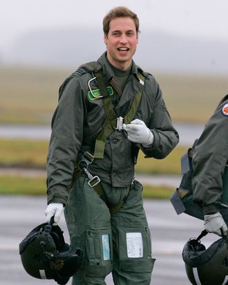 Britain's Prince William gestures as he walks across the airfield at RAF Cranwell, Lincolnshire, England, Thursday, Jan. 17, 2008. The prince, an army officer with the Household Cavalry's Blues and Royals, is two weeks into a four-month attachment with the RAF to help William, get to grips with the service's ethos, traditions and military role. The prince's father, Prince Charles, completed his flying training course at RAF Cranwell from March to August in 1971 and graduated that year as a Flight Lieutenant. While training with 1 Squadron of 1 Elementary Flying Training School, he will fly a propeller driven Grob 115E light aircraft, known as the Tutor. If successful he will move to 1 Flying Training School where he will get to grips with the faster Tucano T1 plane and finally progress to fly the Squirrel helicopter. 