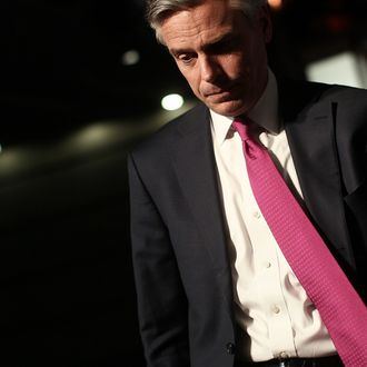 WASHINGTON, DC - OCTOBER 25: Republican presidential candidate Gov. Jon Huntsman leaves the stage after speaking to students at George Washington University October 25, 2011 in Washington, DC. Huntsman jokingly offered comedian Stephen Colbert the vice presidential nomination during an appearance on 