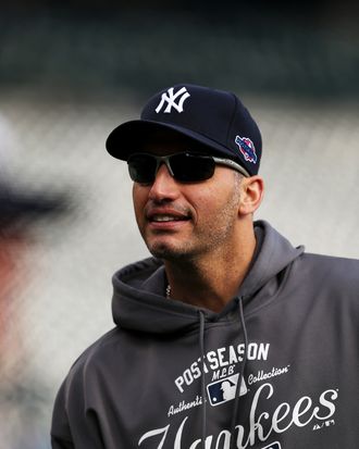 Andy Pettitte #46 of the New York Yankees looks on during batting practice against the Detroit Tigers during game four of the American League Championship Series at Comerica Park on October 18, 2012 in Detroit, Michigan.