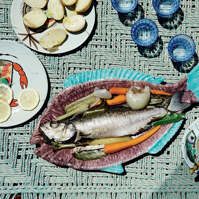 A fish served on a fish plate, at the Missonis dinner table — The Strategist reviews homeware.
