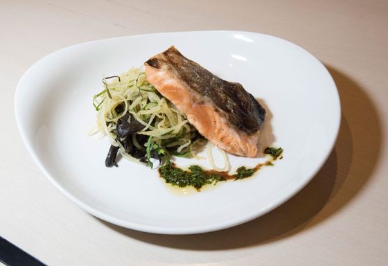 Wild Alaskan salmon with spaghetti squash, turnip greens, and black trumpet mushrooms.