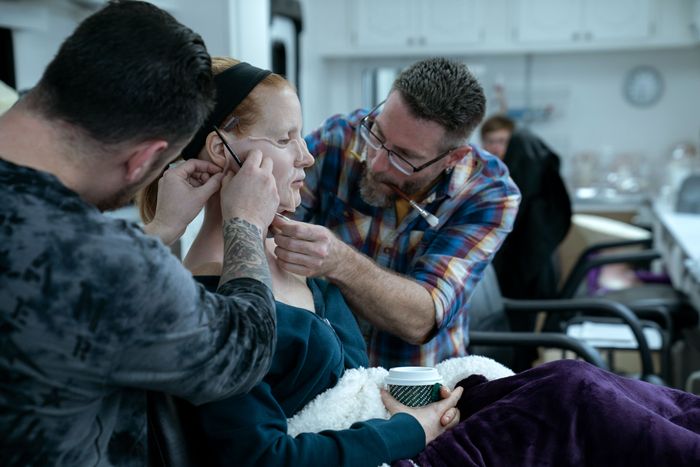 The Eyes of Tammy Faye makeup team applies prosthetics to Jessica Chastain.