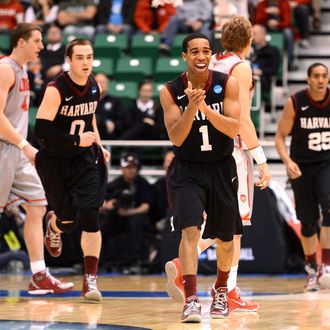 SSiyani Chambers #1 of the Harvard Crimson celebrates after making a three-pointer in the second half while taking on the New Mexico Lobos during the second round of the 2013 NCAA Men's Basketball Tournament at EnergySolutions Arena on March 21, 2013 in Salt Lake City, Utah.