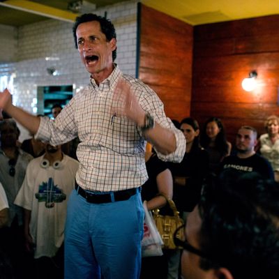 New York mayoral candidate Anthony Weiner stands above supporters as he speaks to them at a gathering to distribute petitions for his campaign Sunday, June 2, 2013, in New York. Earlier in the day, Weiner marched in the Israel Day Parade. 