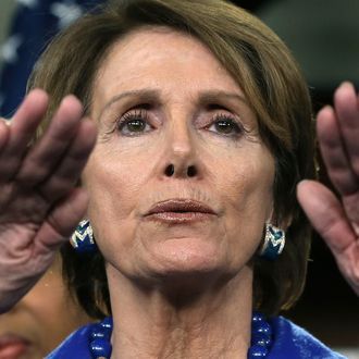  House Minority Leader Rep. Nancy Pelosi (D-CA) speaks to the media as female House Democrats gather around during a news conference at the U.S. Capitol, on November 14, 2012 in Washington, DC. Leader Pelosi said that she has decided continue to lead the House Democrats and does not wish to retire at this time. 