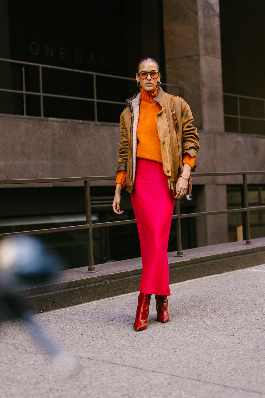 Woman with pink fur coat and brown Louis Vuitton bag before John Richmond  fashion show, Milan Fashion Week street style – Stock Editorial Photo ©  AndreaA. #272372864