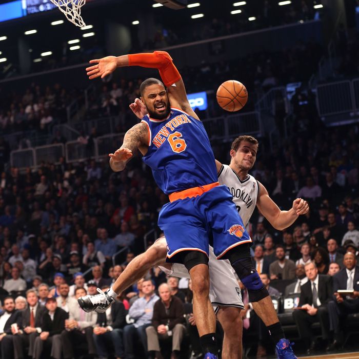 Kris Humphries #43 of the Brooklyn Nets fouls Tyson Chandler #6 of the New York Knicks at the Barclays Center on November 26, 2012 in the Brooklyn borough of New York City.