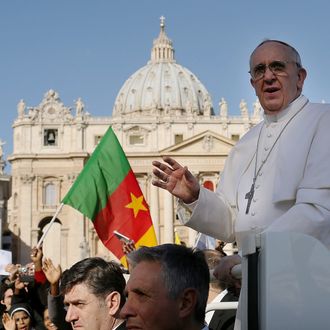 VATICAN CITY, VATICAN - MARCH 19: Pope Francis drives through the crowds during the Inauguration Mass for the Pope in St Peter's Square on March 19, 2013 in Vatican City, Vatican. The mass is being held in front of an expected crowd of up to one million pilgrims and faithful who have filled the square and the surrounding streets to see the former Cardinal of Buenos Aires officially take up his role as pontiff. (Photo by Spencer Platt/Getty Images)