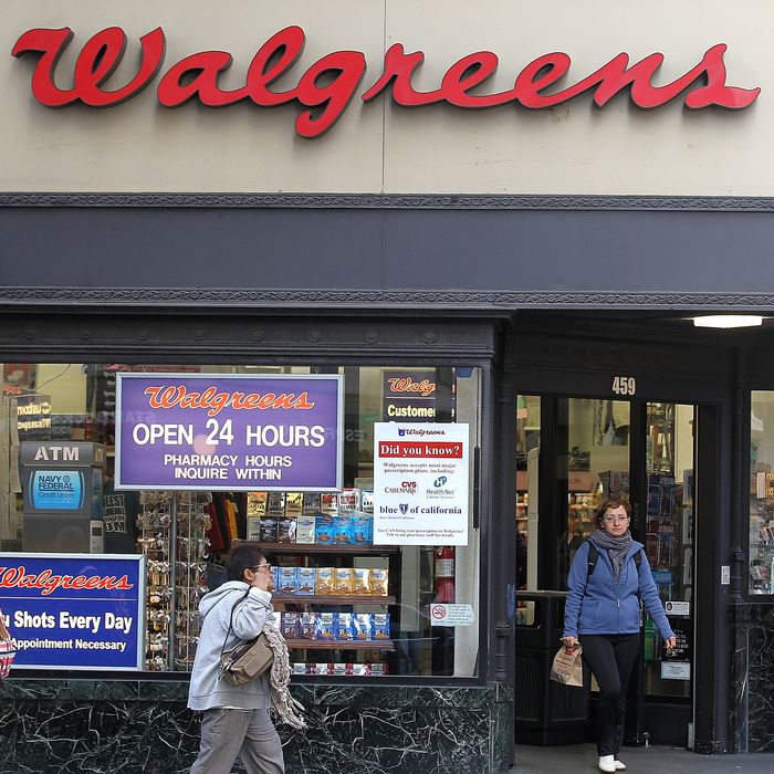 SAN FRANCISCO, CA - JUNE 19: People walk by a Walgreens store on June 19, 2012 in San Francisco, California. U.S. based drug store chain Walgreens has announced a deal to purchase a 45 percent stake in European pharmacy retailer Alliance Boots for $6.7 billion. The acquisition will make Walgreens one of the world's largest drug store and pharmacy retailers with 11,000 stores in 12 countries. (Photo by Justin Sullivan/Getty Images)