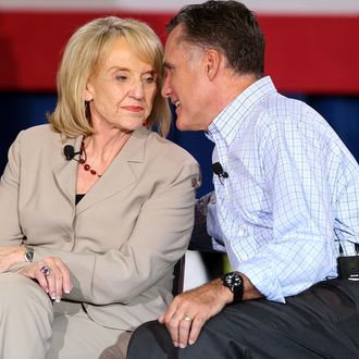 BASALT, CO - AUGUST 02: Republican presidential candidate and former Massachusetts Gov. Mitt Romney (R) talks with Arizona Governor Jan Brewer (L) during a campaign event with Republican Governors at Basalt Public High School on August 2, 2012 in Basalt, Colorado. One day after returning from a six-day overseas trip to England, Israel and Poland, Mitt Romney is campaigning in Colorado before heading to Nevada. (Photo by Justin Sullivan/Getty Images)