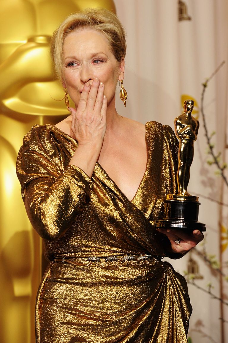 The Many Creative Ways Oscar Winners Pose With Their Trophies