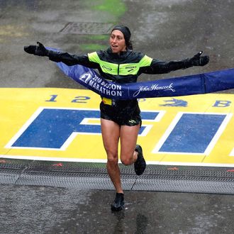 Desiree Linden crossing the finish line.