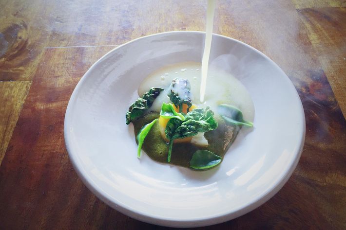 Slow-cooked egg yolk, wild spinach, and dried scallops.