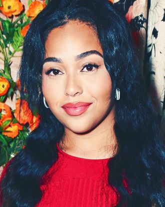 Jordyn Woods Debuts Red Hair in Bold Sheer Dress & Louboutins – Footwear  News