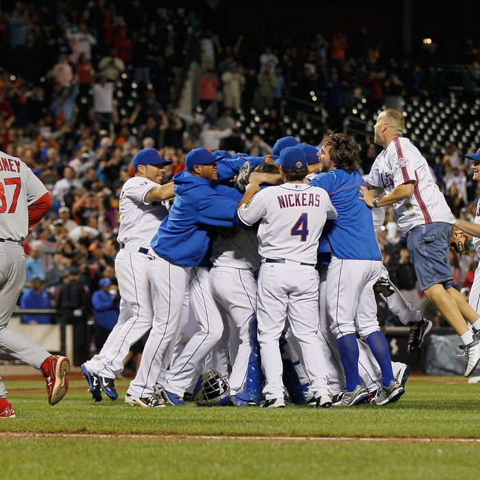 Johan Santana #57 of the New York Mets celebrates with his teammates after pitching a no-hitter against the St. Louis Cardinals at CitiField on June 1, 2012 in the Flushing neighborhood of the Queens borough of New York City. The no-hitter was the first in in Mets history. The Mets won 8-0.