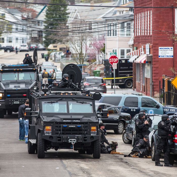 WATERTOWN, MA - APRIL 19: SWAT teams moved into position at the intersection of Nichols Avenue and Melendy Avenue in Watertown while searching for one of the two marathon bombing suspects. (Photo by Aram Boghosian for The Boston Globe via Getty Images)