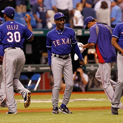 ST. PETERSBURG - OCTOBER 03: Manager Ron Washington #38 of the Texas Rangers celebrates his team's victory over the Tampa Bay Rays in Game Three of the American League Division Series at Tropicana Field on October 3, 2011 in St. Petersburg, Florida. (Photo by J. Meric/Getty Images)