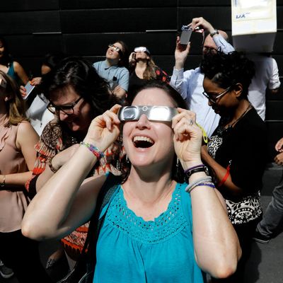 People View The American Solar Eclipse In Manhattan