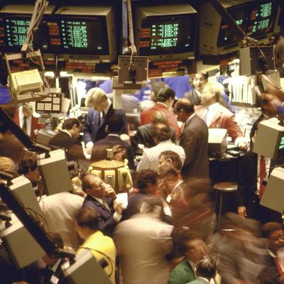 People working on the trading floor of t