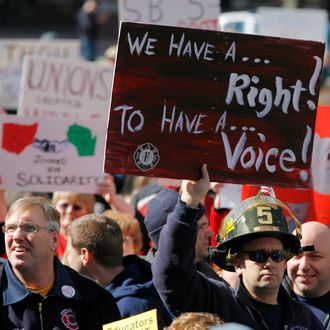 Union supporters make their way into the Ohio Captial building as Gov. John Kasich begins his State of the State address on March 8, 2011 in Columbus, Ohio. 