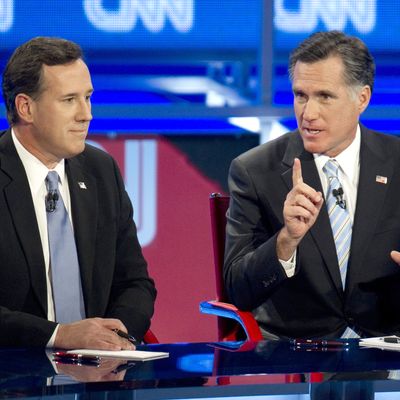 Republican presidential candidates Rick Santorum (L) and Mitt Romney debate on February 22, 2012 in Mesa, Arizona. The Arizona and Michigan primaries are scheduled to be held February 28. AFP PHOTO/DON EMMERT (Photo credit should read DON EMMERT/AFP/Getty Images)