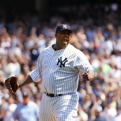  CC Sabathia celebrates pitching a complete game against the Tampa Bay Rays.