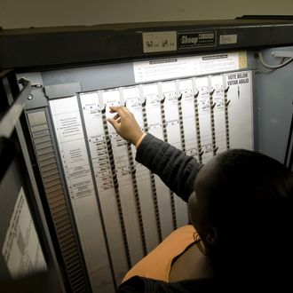 A voter votes in the 2008 US general election at a voting site on Frederick Douglass boulevard in Harlem, New York, NY, United States, 4 November 2008.