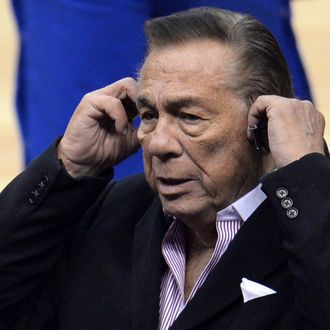Los Angeles Clippers owner Donald Sterling attends the NBA playoff game between the Clippers and the Golden State Warriors, April 21, 2014 at Staples Center in Los Angeles, California. NBA Commissioner Adam Silver said April 26 that the NBA is investigating Sterling for alleged racist comments. AFP PHOTO / ROBYN BECK (Photo credit should read ROBYN BECK/AFP/Getty Images)