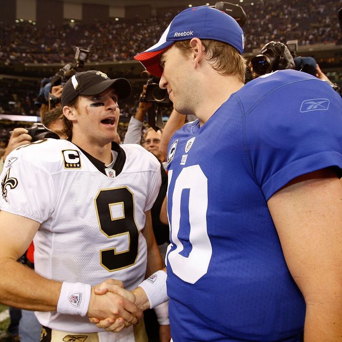 NEW ORLEANS - OCTOBER 18: Drew Brees #9 of the New Orleans Saints is congratulated by Eli Manning #10 of the New York Giants after the Saints defeated the Giants 48-27 at the Louisiana Superdome on October 18, 2009 in New Orleans, Louisiana. (Photo by Chris Graythen/Getty Images) *** Local Caption *** Drew Brees;Eli Manning