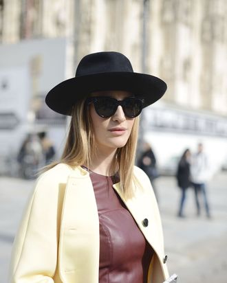 A stylish showgoer in a Borsalino hat. 