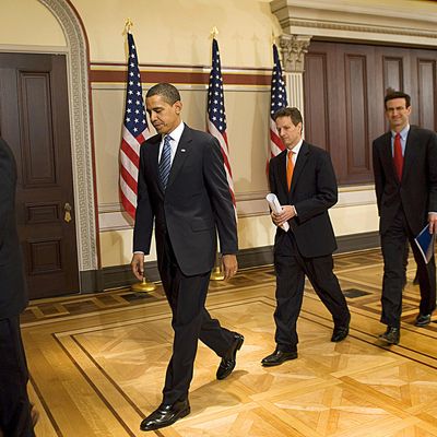 US President Barack Obama (2nd L) departs with Vice President Joe Biden (L), US Treasury Secretary Timothy Geithner (2nd R) and Director of the Office of Management and Budget Peter Orszag (R) after making comment on the Fiscal Year 2010 budget in the Eisenhower Executive Office Buildingin Washington, DC, February 26, 2009. Obama Thursday unveils his first budget projecting spending of a whopping 3.606 trillion dollars for fiscal 2010 and outlining aggressive plans to fix the US economy and its health care system. The plan, which encompasses Obama's efforts to pull the country out of its worst economic crisis since the Great Depression of the 1930s, would see the government deficit soar to the largest percentage of the US gross domestic product since World War II.