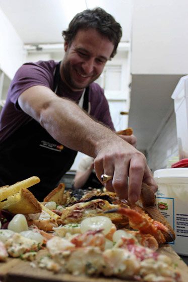 Dufour prepares the seafood smorgasbord.