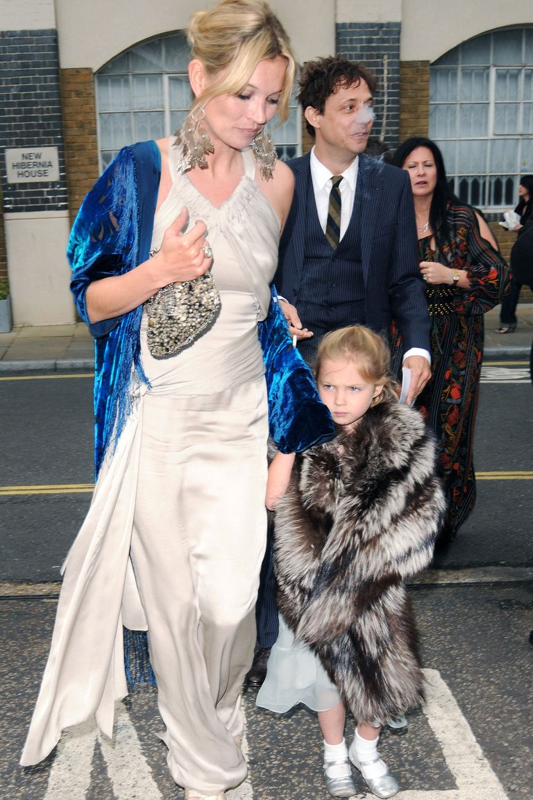 LONDON - JUNE 21: Kate Moss and daughter Lila Moss attend  Leah Wood and Jack MacDonald’s Wedding on June 21, 2008 in London, England.  (Photo by Sylvia Linares/FilmMagic)