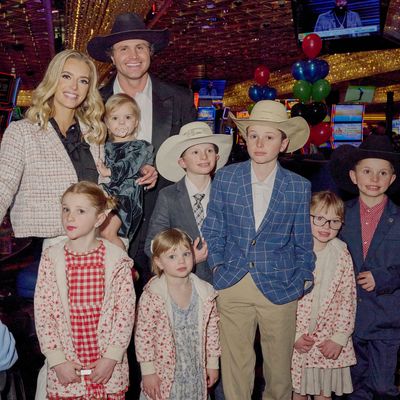 Hannah Neeleman, last year’s Mrs. American pageant winner, with her family during the Mrs. World beauty pageant at the Westgate Hotel and Casino in Las Vegas, Jan. 19, 2024. (Bridget Bennett/The New York Times)