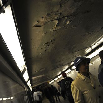 New York commuters make their way throug