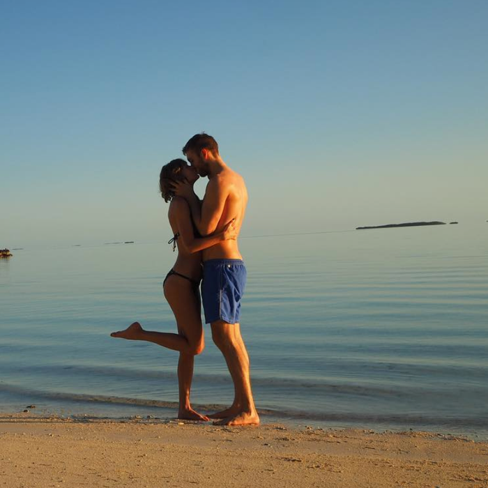 Taylor Swift, sand, water, maddeningly picturesque background, boyfriend. Taylor Swift/Instagram 