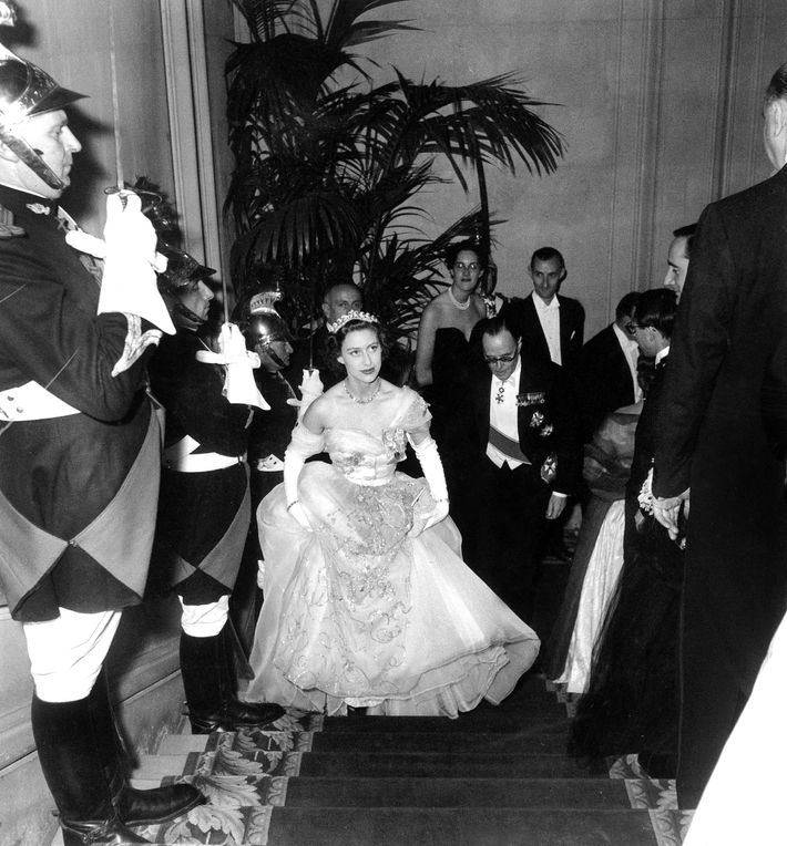 Princess Diana in a white dress, Christian Dior sunglasses and a