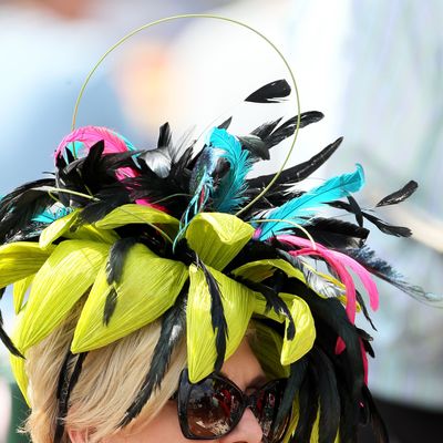 LOUISVILLE, KY - MAY 05: A horseracing fan wears a decorative hat prior to the 138th running of the Kentucky Derby at Churchill Downs on May 5, 2012 in Louisville, Kentucky. (Photo by Elsa/Getty Images)