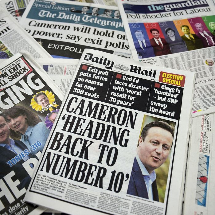 A picture of an arrangement of British newspapers carrying headlines dominated by exit poll forecasts in favour of the Conservative Party in the British general election taken in London on May 8, 2015. Prime Minister David Cameron's Conservatives are on course to be the biggest party in the next British parliament, according to an exit poll from the general election showing them winning far more seats than had been expected. AFP PHOTO / DANIEL SORABJI (Photo credit should read DANIEL SORABJI/AFP/Getty Images)