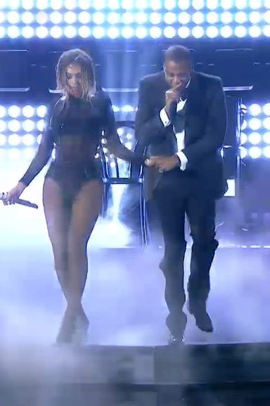 Is there a greater defense of monogamy than Jay Z holding Beyoncé's hand while she walks down stairs during their Grammy-opening performance?
