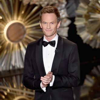 Neil Patrick Harris wears a Louis Vuitton tuxedo, Dolce and